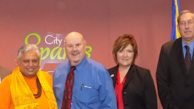 Just before the Hindu invocation, from left to right are—Councilmember Ed Lawson, Councilmember Ron Smith, Hindu statesman Rajan Zed, Mayor Geno R. Martini, Councilmember Charlene Bybee, Councilmember Ron Schmitt, and City Manager Steve Driscoll.